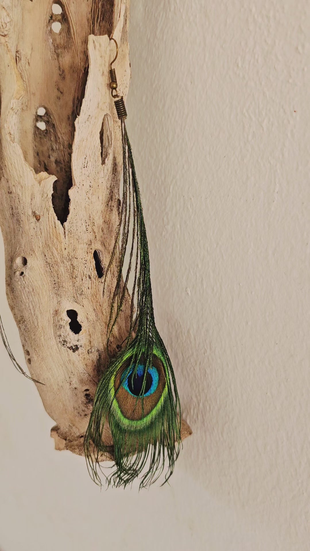 Pluma de pavo real pendientes