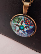 Collar con colgante,  dibujo de pentáculo con rama de árbol