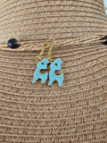 Pendientes de llama en rosa, azul, blanco y negro