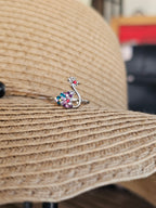 Delicado anillo con pavo real