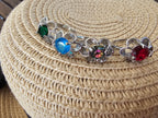 Lindo anillo con forma floral en varios colores