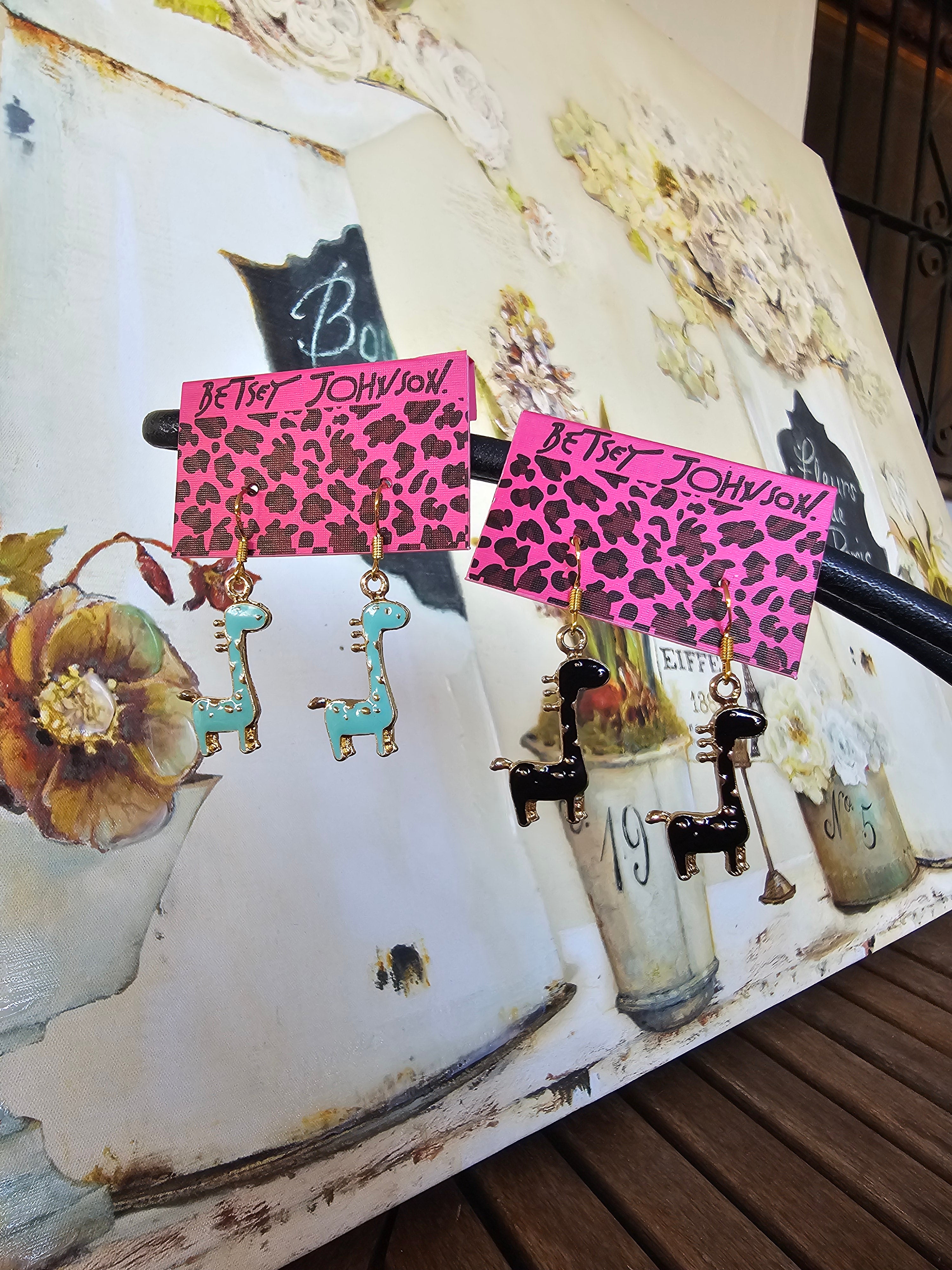 Dulces pendientes eb forma de jirafa