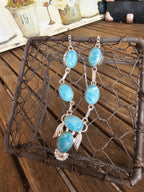 Bonito collar lavalier con alas