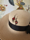 Elegantes pendientes con cristales rojos