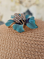 Colgante y brocha de Betsey Johnson