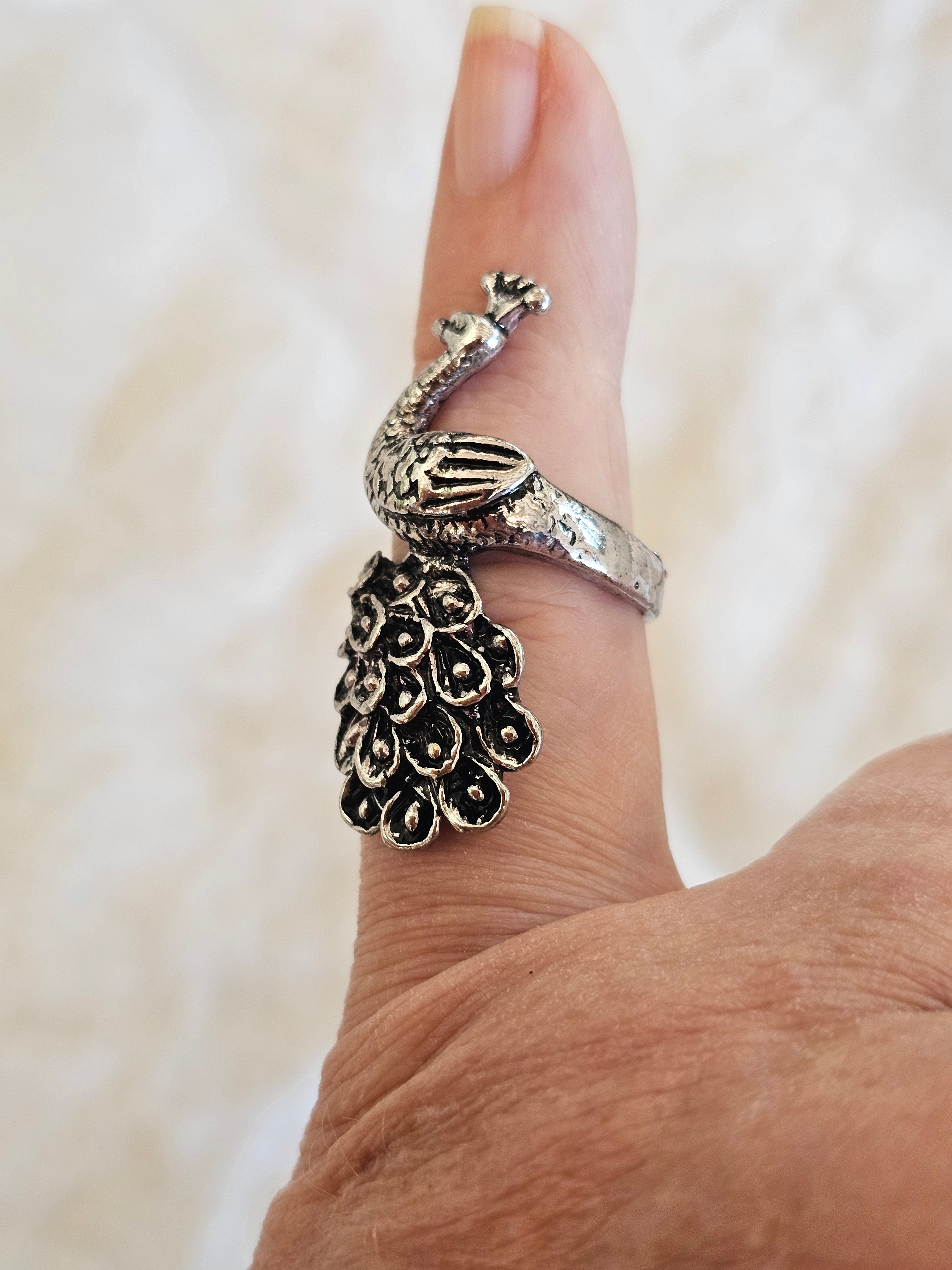 Anillo magnífico de pavo real