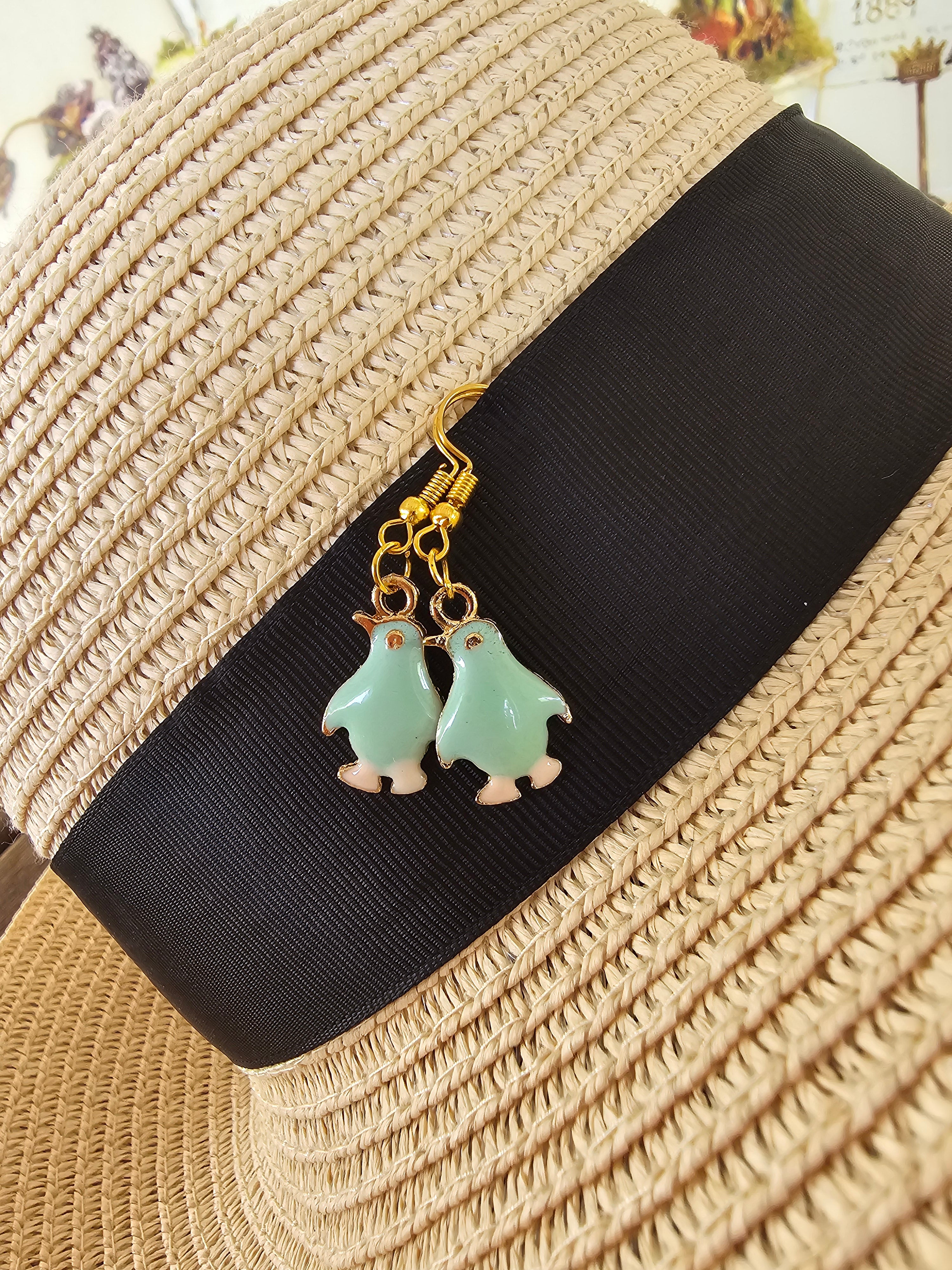 Agradables pendientes pingüino