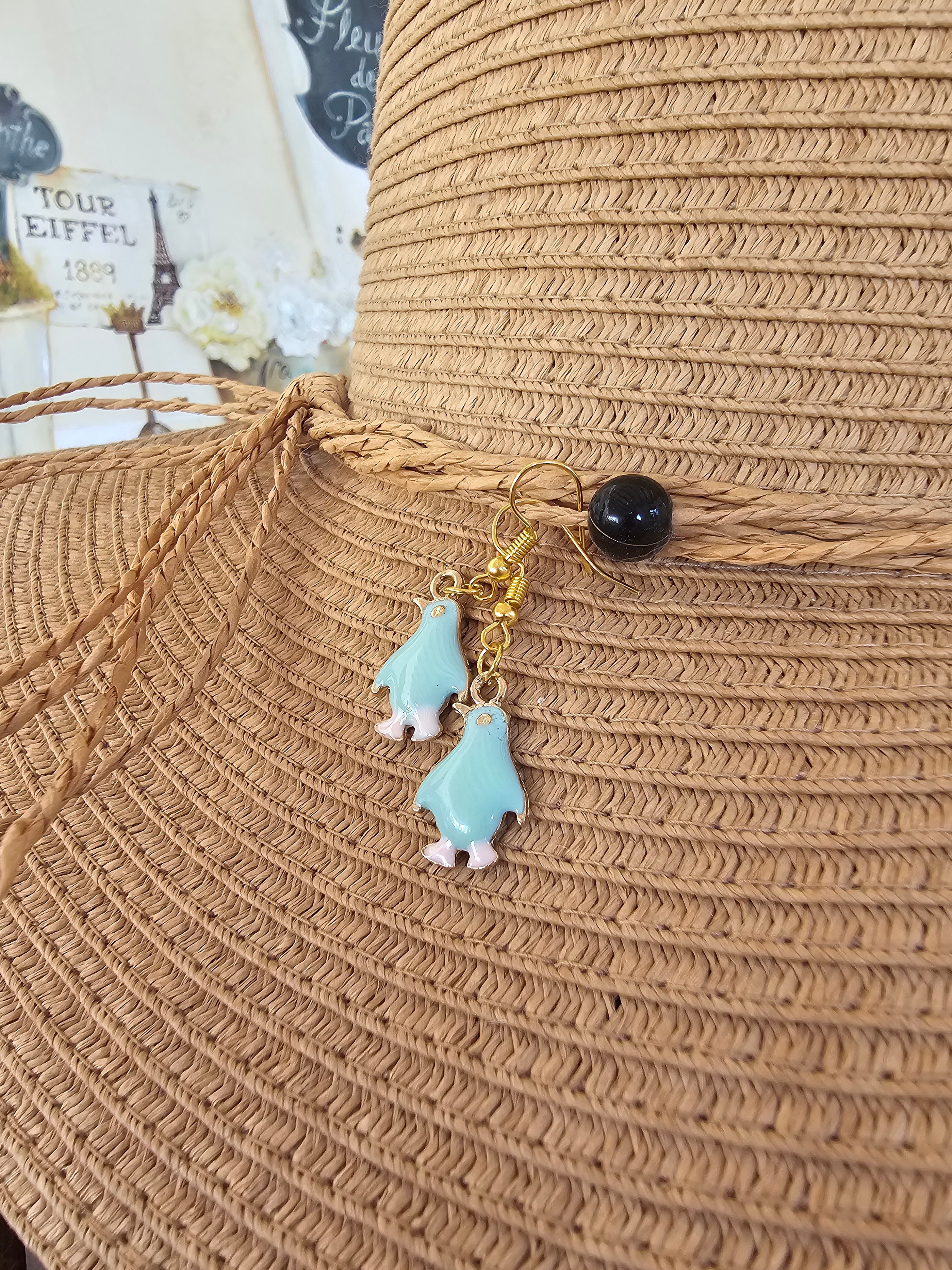 Agradables pendientes pingüino