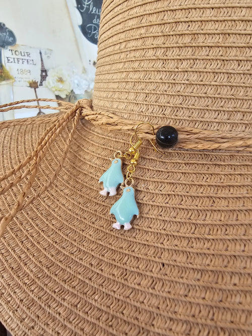 Agradables pendientes pingüino