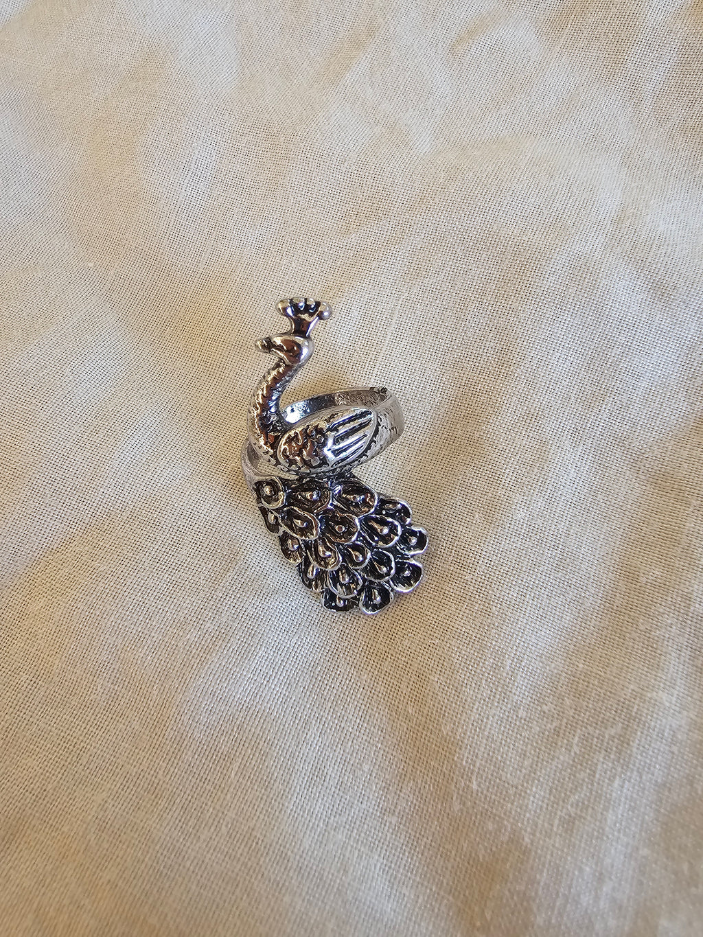 Anillo magnífico de pavo real