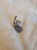 Anillo magnífico de pavo real
