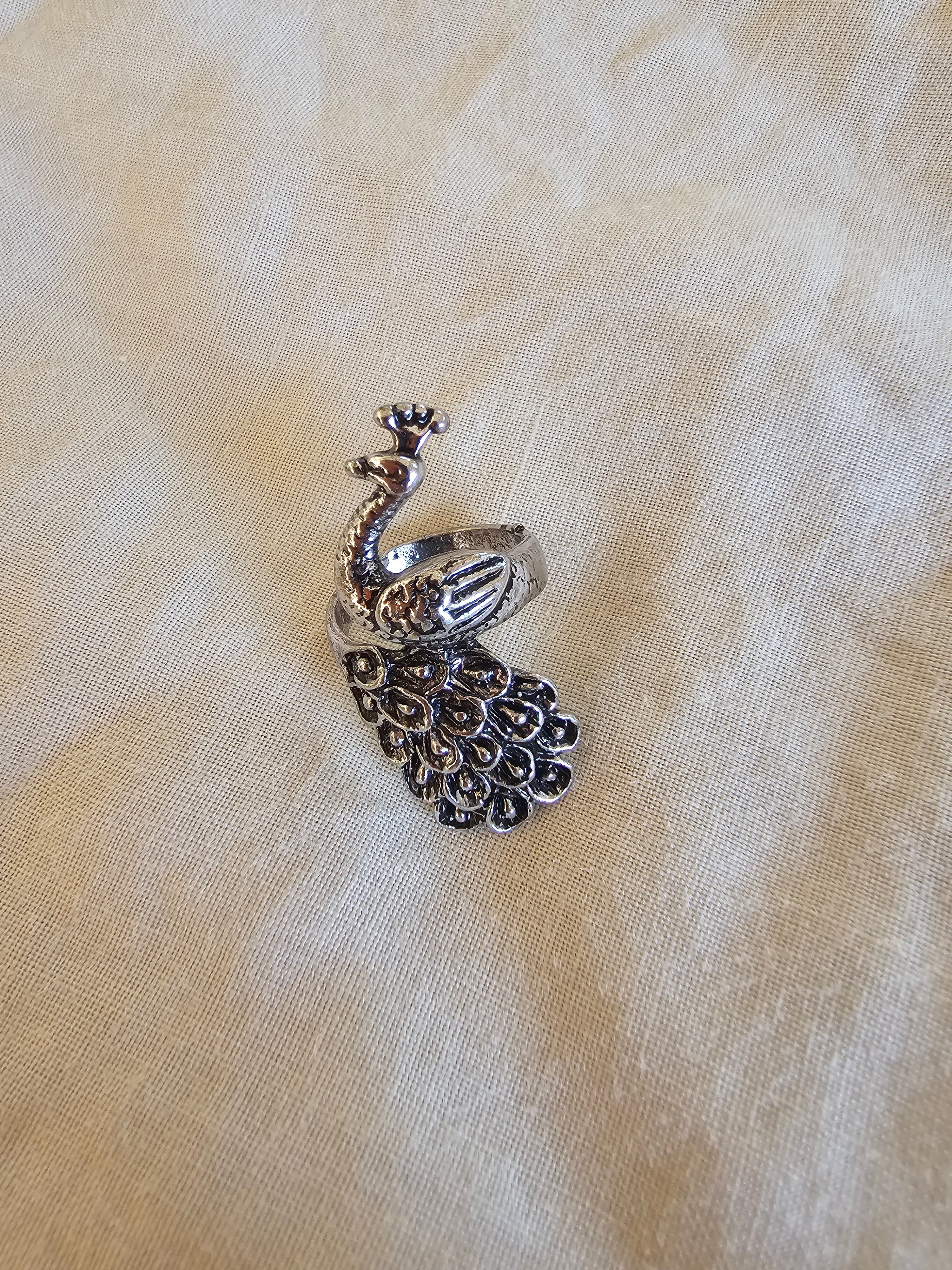 Anillo magnífico de pavo real