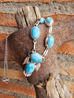 Bonito collar lavalier con alas