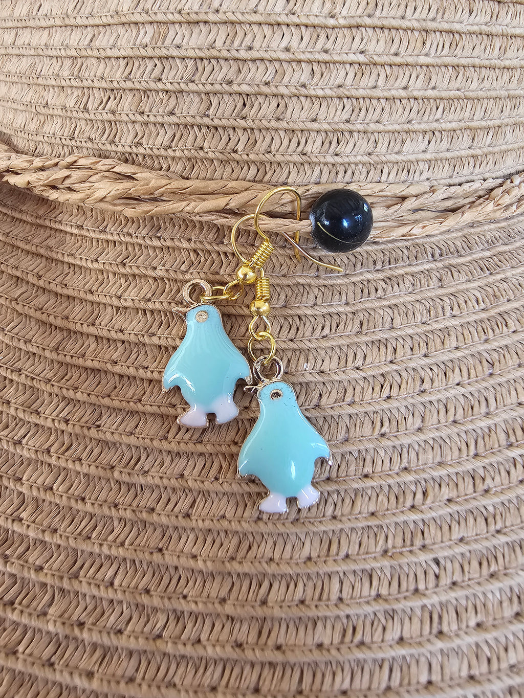 Agradables pendientes pingüino